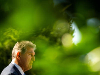 Sen. Joe Manchin speaks to members of the press following the signing of H.R. 5376, the Inflation Reduction Act of 2022, into law in the State Dining Room of the White House on August 16, 2022, in Washington, D.C.