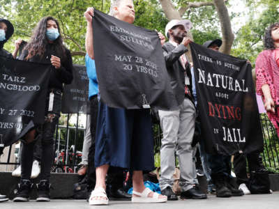 Family members, activists, and others hold a rally outside of city hall to demand that the administration of New York City Mayor Eric Adams do more to address the crisis in living conditions at the Rikers Island Jail on June 23, 2022.