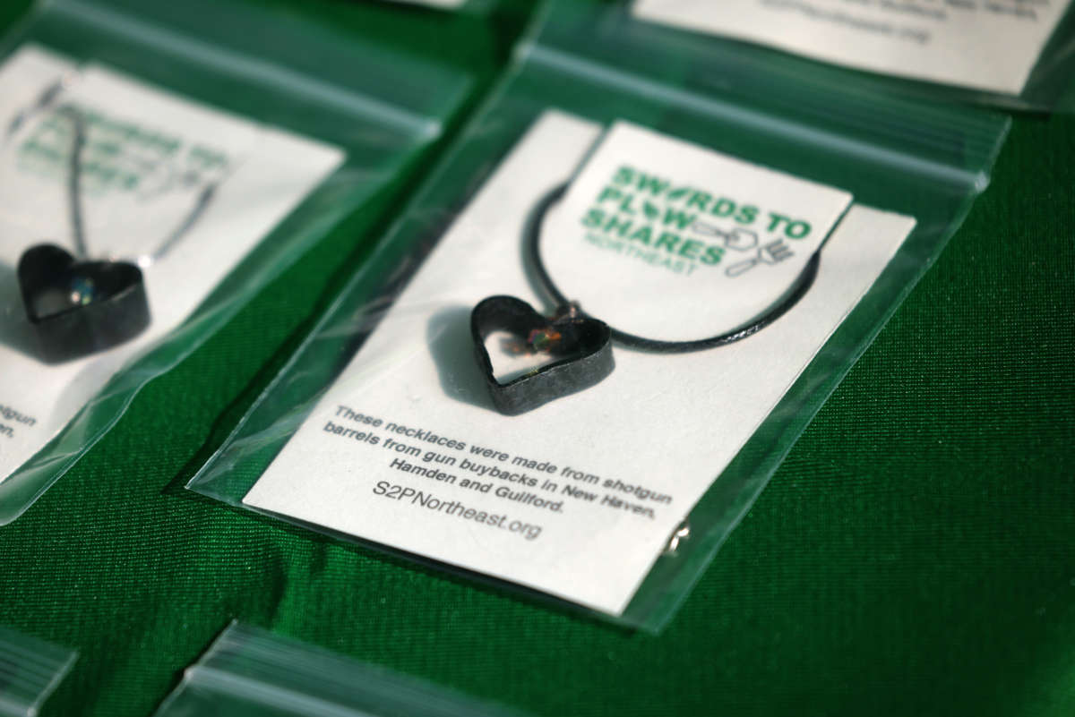 Iron hearts charms made from gun barrels are seen being displayed