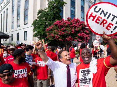 Rep. Andy Levin joined UNITE union members as they protest outside the Senate office buildings in support of Senate cafeteria workers employed by Restaurant Associates on Capitol Hill on July 20, 2022, in Washington, D.C.