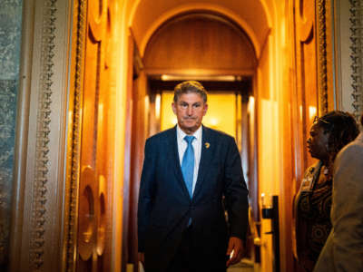 Sen. Joe Manchin departs from the Senate side of the U.S. Capitol Building after a series of amendment votes on the Inflation Reduct Act at the U.S. Capitol on August 7, 2022, in Washington, D.C.