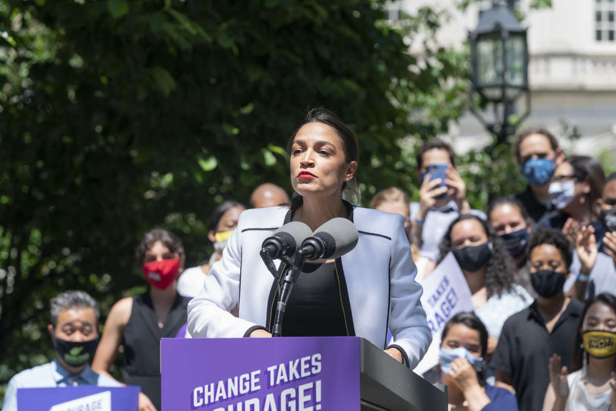 Rep. Alexandria Ocasio-Cortez speaks at a rally where she endorsed progressive candidates in elections for city-wide offices in City Hall Park, New York City, on June 5, 2021.