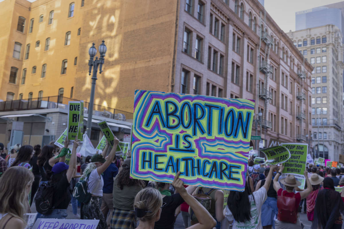 Protesters gather in reaction to the announcement of the Dobbs v. Jackson Women's Health Organization ruling on June 24, 2022, in Los Angeles, California.