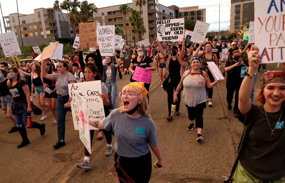 Abortion rights protesters chant during a reproductive rights rally near the Tucson Federal Courthouse in Tucson, Arizona, on Monday, July 4, 2022.