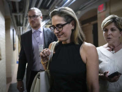 Sen. Kyrsten Sinema walks to a vote at the U.S. Capitol on July 28, 2022 in Washington, D.C.