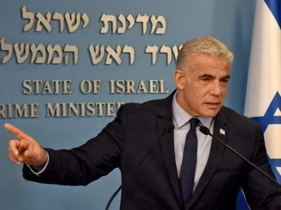 Israeli Prime Minister Yair Lapid speaks at a security briefing about Iran for the foreign press at the Prime Minister's office in Jerusalem on August 24, 2022.