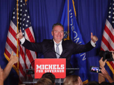 Republican gubernatorial candidate Tim Michels greets guests at a rally on August 9, 2022, in Waukesha, Wisconsin. Michels, who was endorsed by former President Donald Trump, won the Republican nomination against former Lt. Gov. Rebecca Kleefisch, who was endorsed by former Vice President Mike Pence.