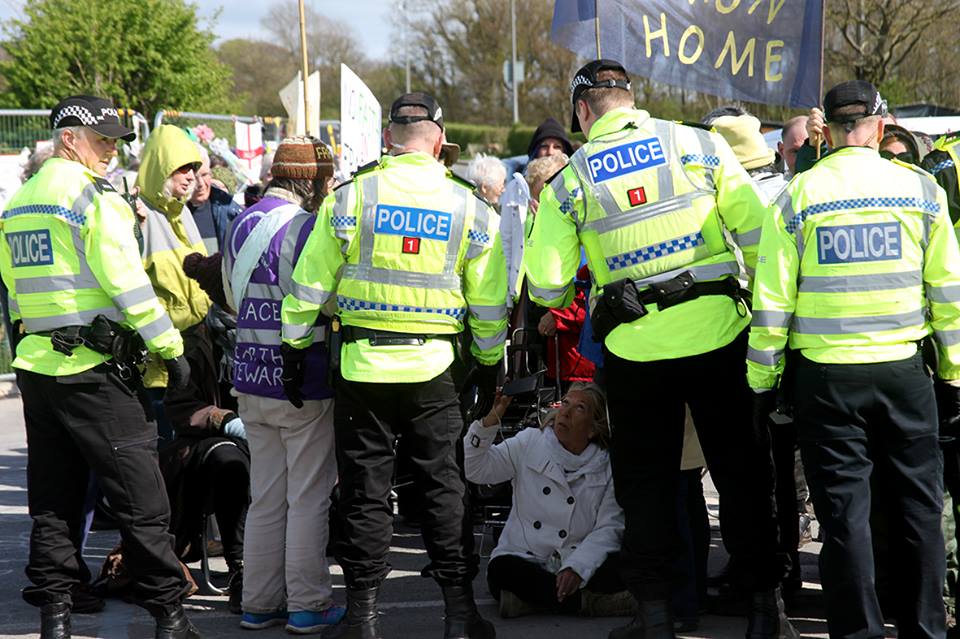 Campaigner Tina Rothery refuses to move out of the way of a truck entering the Preston New Road site and is arrested.