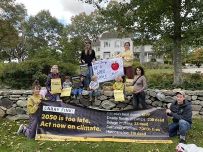 NYC Climate Families Coalition members and their children protest outside the home of BlackRock CEO Larry Fink in October 2021.
