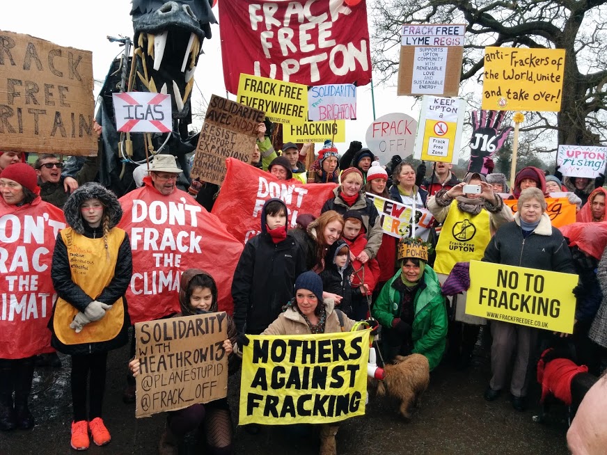 Residents, campaigners and a “fracking monster” gather at a fracking site in Upton.