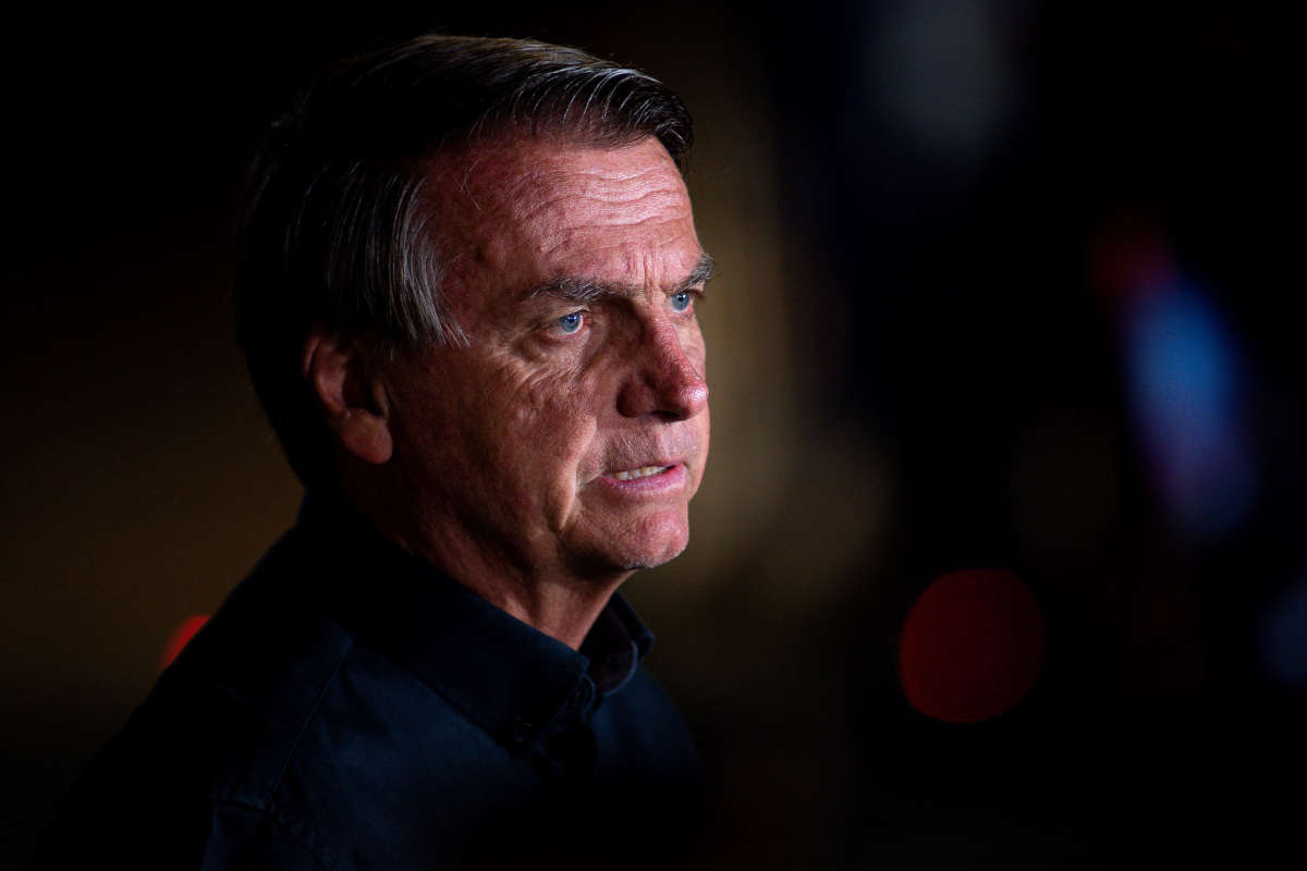 Brazilian President Jair Bolsonaro talks during a press conference at the end of the general elections day at the main entrance of Alvorada Palace on October 2, 2022, in Brasilia, Brazil.