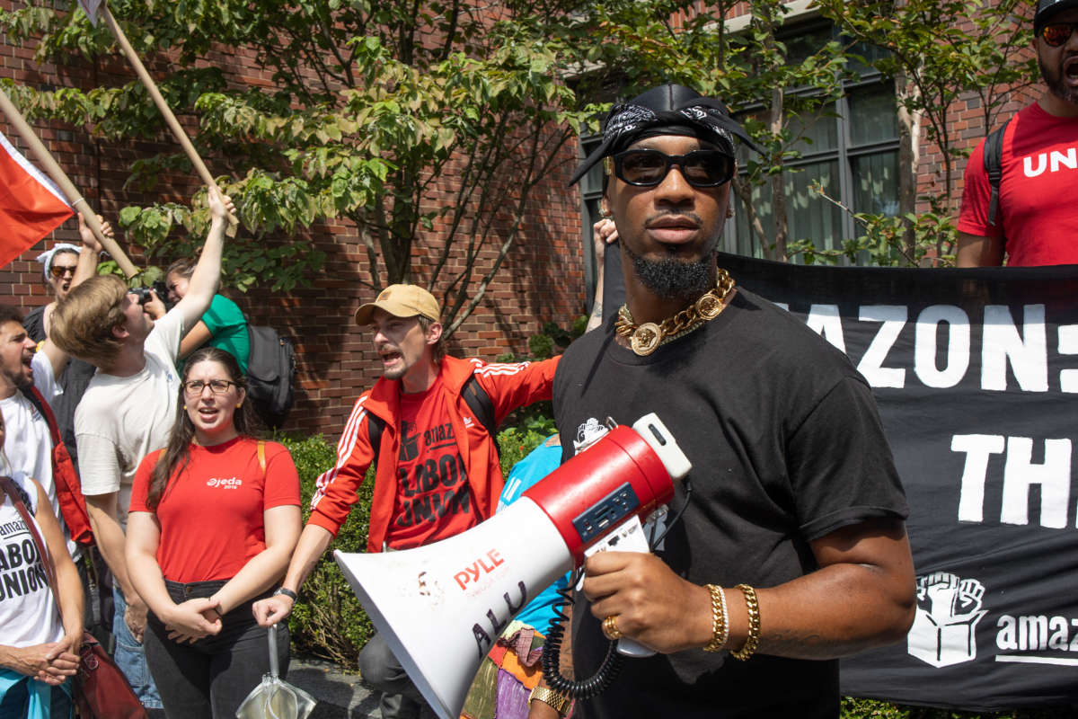 Chris Smalls, a leader of the Amazon Labor Union, leads a march of Starbucks and Amazon workers and their allies to the homes of their CEOs to protest union busting on September 5, 2022, in New York City.