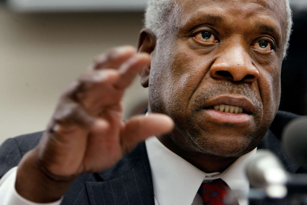 Supreme Court Justice Clarence Thomas testifies before the House Financial Services and General Government Subcommittee on Capitol Hill on March 13, 2008, in Washington, D.C.