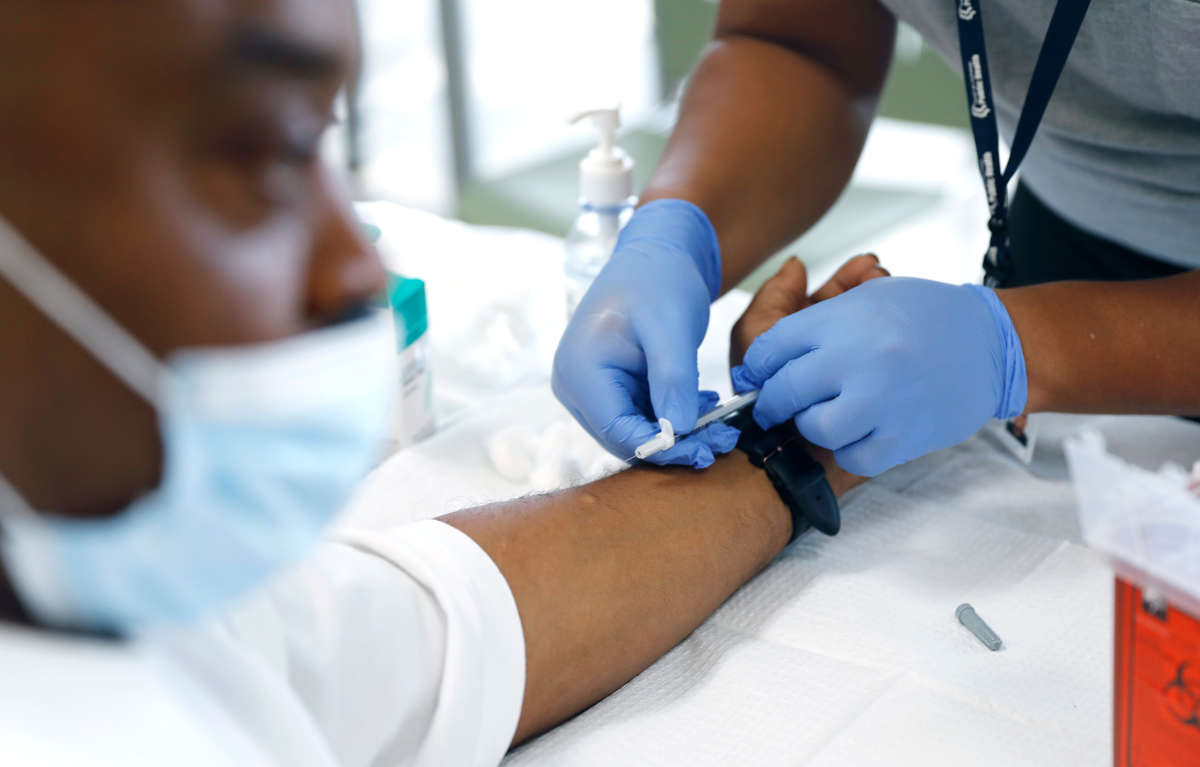 A man recieves a monkeypox vaccine