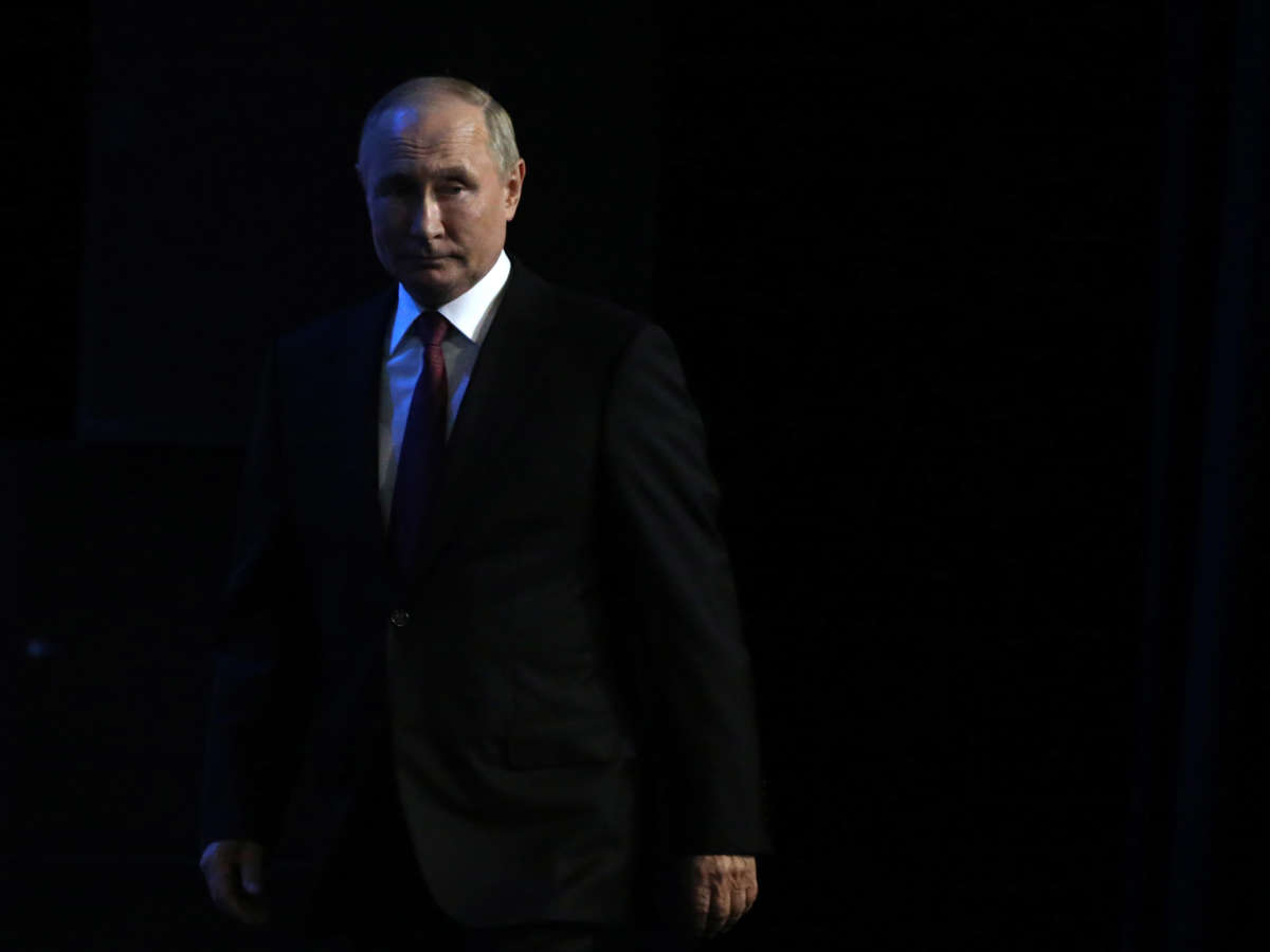 Russian President Vladimir Putin enters the hall during a concert at the Grand Kremlin Palace, September 20, 2022, in Moscow, Russia.