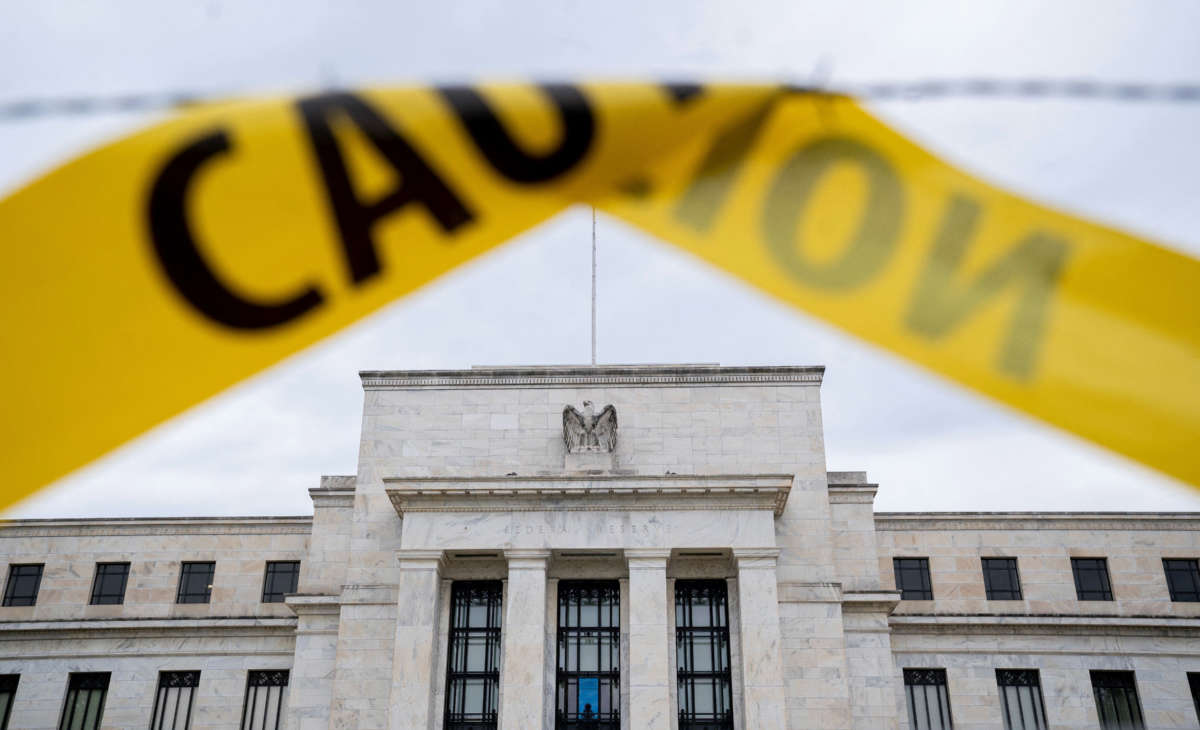 The U.S. Federal Reserve building is seen past caution tape in Washington, D.C., on September 19, 2022.