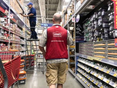 Employees work inside a Lowe's store on August 2, 2019, in Los Angeles, California.