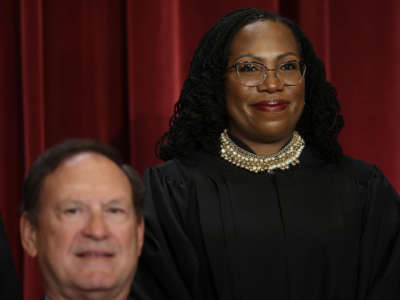 Supreme Court Associate Justice Samuel Alito, left, and Associate Justice Ketanji Brown Jackson pose for an official portrait at the East Conference Room of the Supreme Court building on October 7, 2022, in Washington, D.C.
