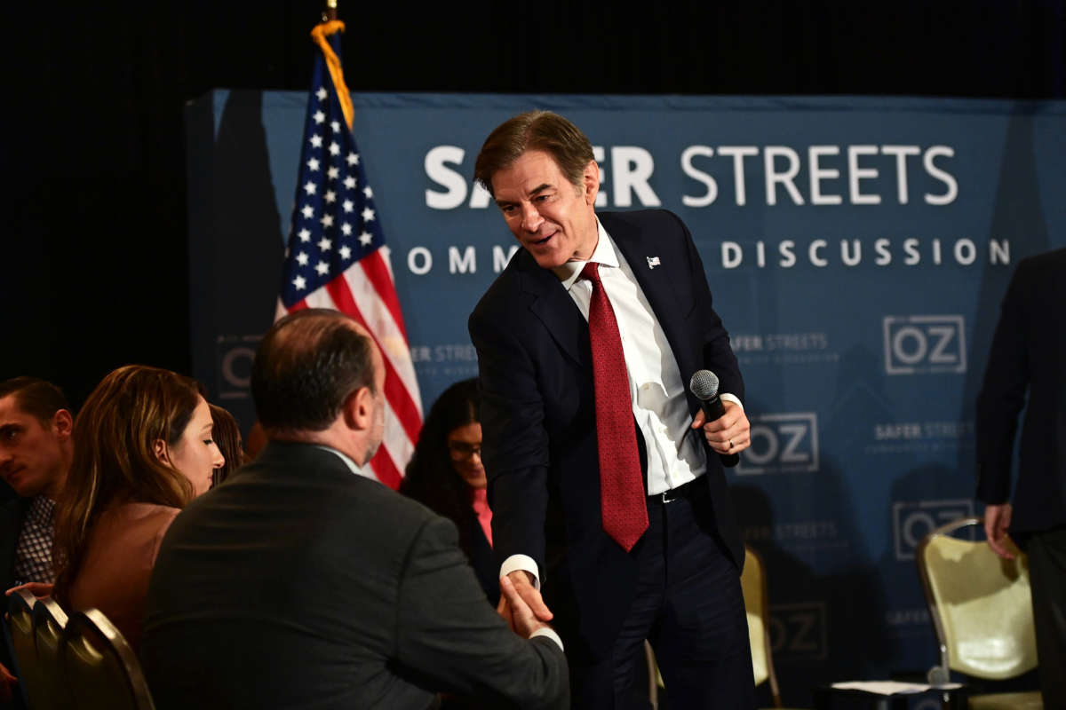 Republican Senate candidate Dr. Mehmet Oz greets supporters following a safer streets community discussion at Galdos Catering and Entertainment on October 13, 2022, in Philadelphia, Pennsylvania.