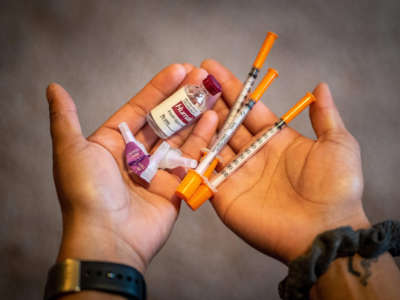 A person shows their insulin kit on January 17, 2020, in St.Paul, Minnesota.