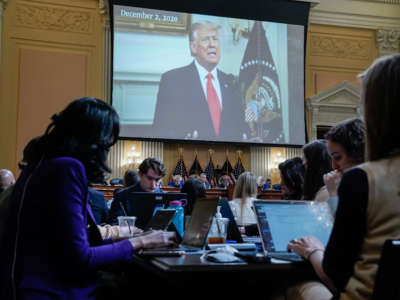 Then-President Donald Trump is seen on the screen as the House select committee investigating the January 6 attack on the U.S. Capitol holds a hearing on Capitol Hill on October 13, 2022, in Washington, D.C.