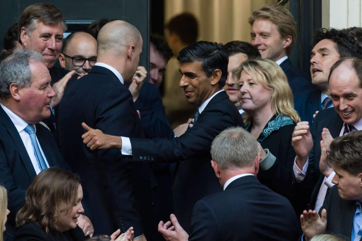 Rishi Sunak is greeted by supporters as he arrives at the Conservative Party Campaign Headquarters after being announced the winner of Conservative Party leadership contest in London, United Kingdom, on October 24, 2022.