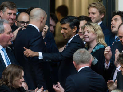 Rishi Sunak is greeted by supporters as he arrives at the Conservative Party Campaign Headquarters after being announced the winner of Conservative Party leadership contest in London, United Kingdom, on October 24, 2022.