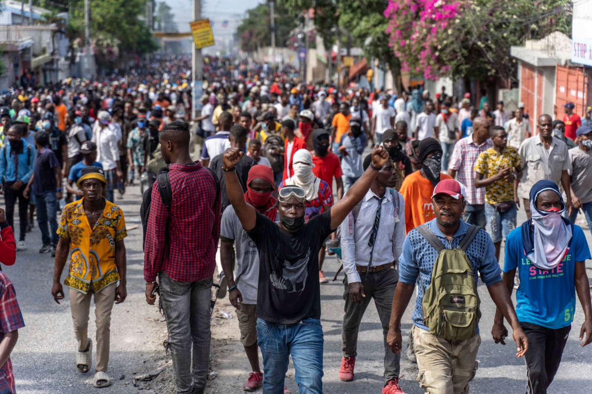 Demonstrators fill the streets during a protest to demand the resignation of Prime Minister Ariel Henry, in the Petion-Ville area of Port-au-Prince, Haiti, on October 3, 2022.