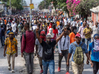 Demonstrators fill the streets during a protest to demand the resignation of Prime Minister Ariel Henry, in the Petion-Ville area of Port-au-Prince, Haiti, on October 3, 2022.