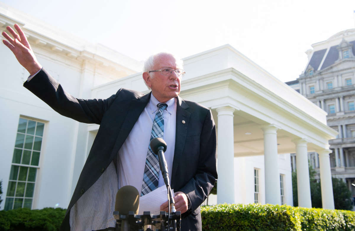 Sen. Bernie Sanders speaks to the media outside the West Wing of the White House in Washington, D.C, on July 12, 2021.