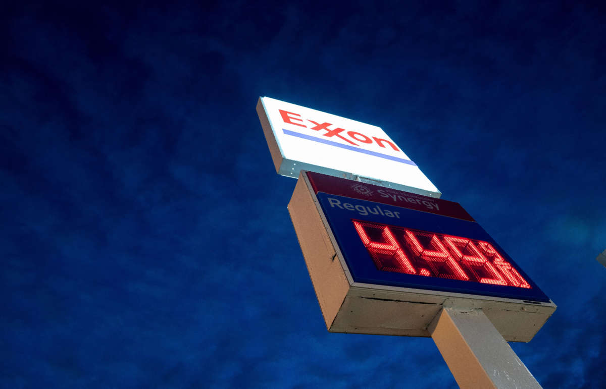 A sign displays the price of gas at an Exxon gas station in Washington, D.C., on March 13, 2022.