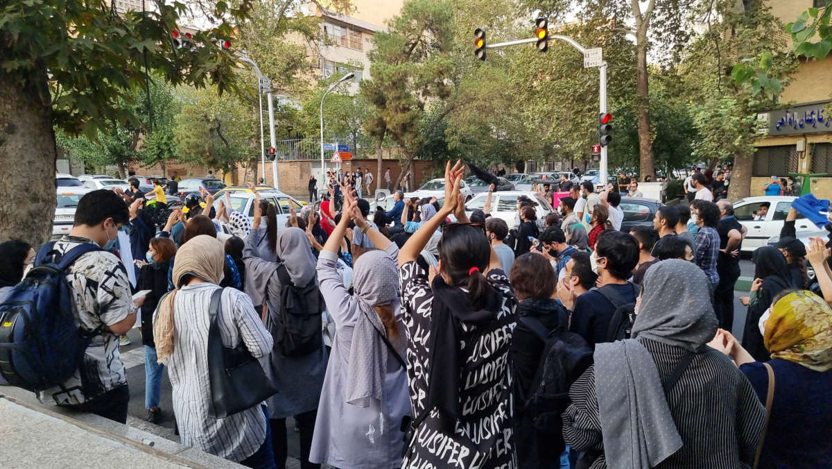 People gather in protest following the death of Mahsa Amini, on September 19, 2022, in Tehran, Iran.