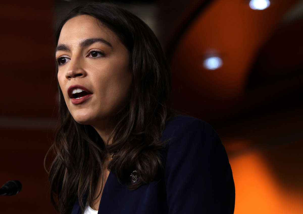 Rep. Alexandria Ocasio-Cortez speaks during a news conference at the U.S. Capitol on December 8, 2021, in Washington, D.C.