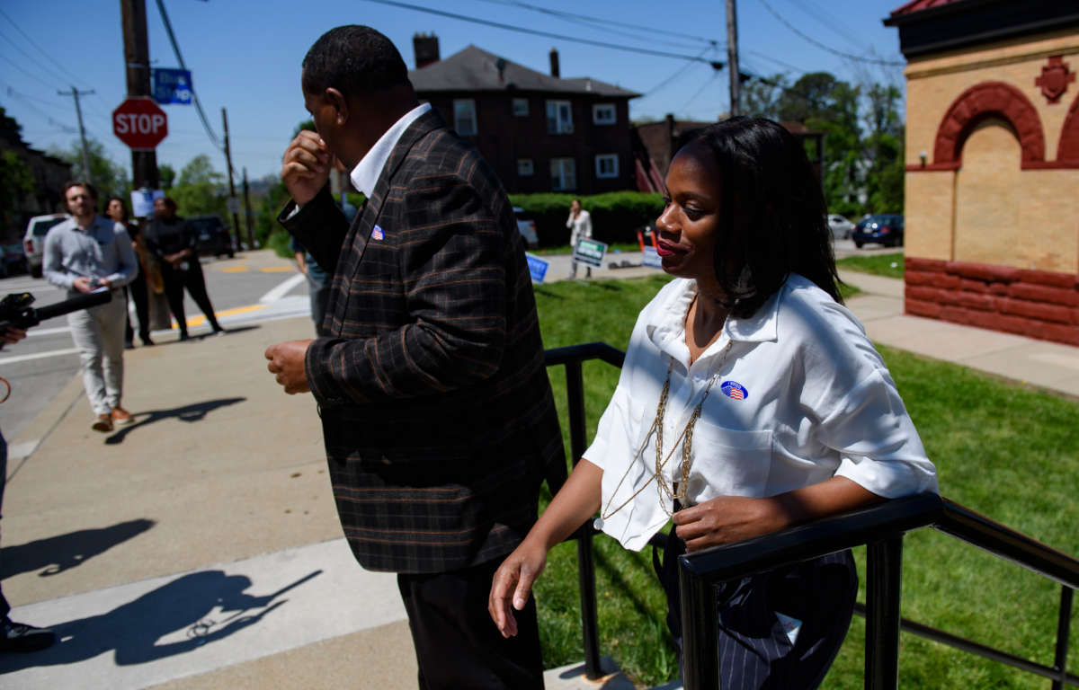 Pennsylvania State Rep. Summer Lee leaves her polling station at the Paulson Recreation Center after voting with Pittsburgh Mayor Ed Gainey, left, on May 17, 2022, in Pittsburgh, Pennsylvania.