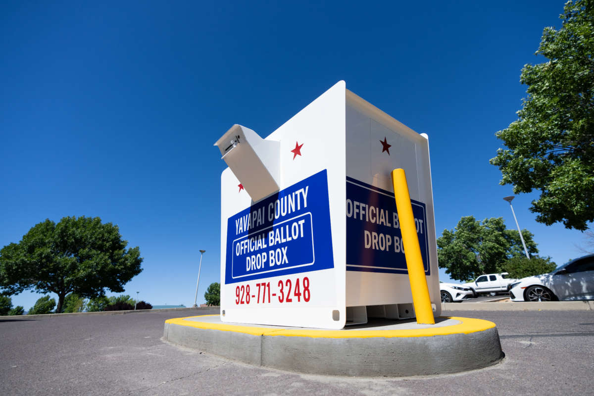 A Yavapai County ballot drop box stands in a parking lot in Prescott Valley, Arizona, on the first day of early voting for the primary election, Wednesday, July 6, 2022.