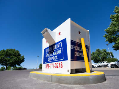 A Yavapai County ballot drop box stands in a parking lot in Prescott Valley, Arizona, on the first day of early voting for the primary election, Wednesday, July 6, 2022.