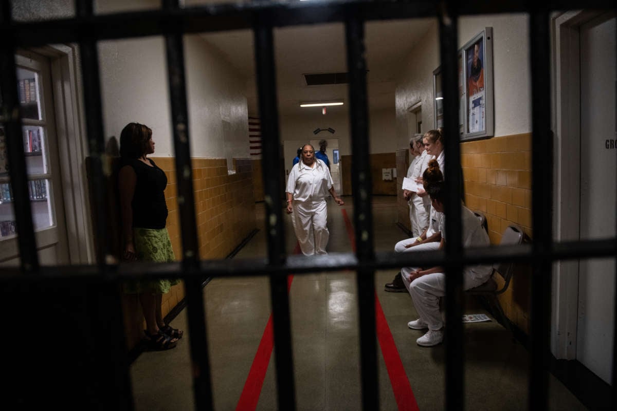 Incarcerated people waiting in the Julia Tutwiler Correctional Facility on August 20, 2018 in Wetumpka, Alabama.
