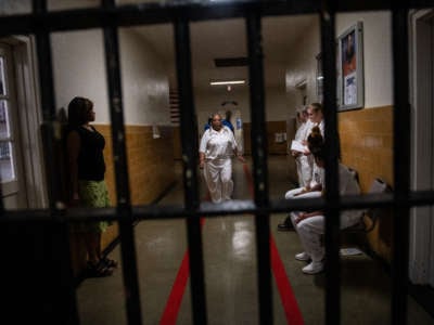Incarcerated people waiting in the Julia Tutwiler Correctional Facility on August 20, 2018 in Wetumpka, Alabama.