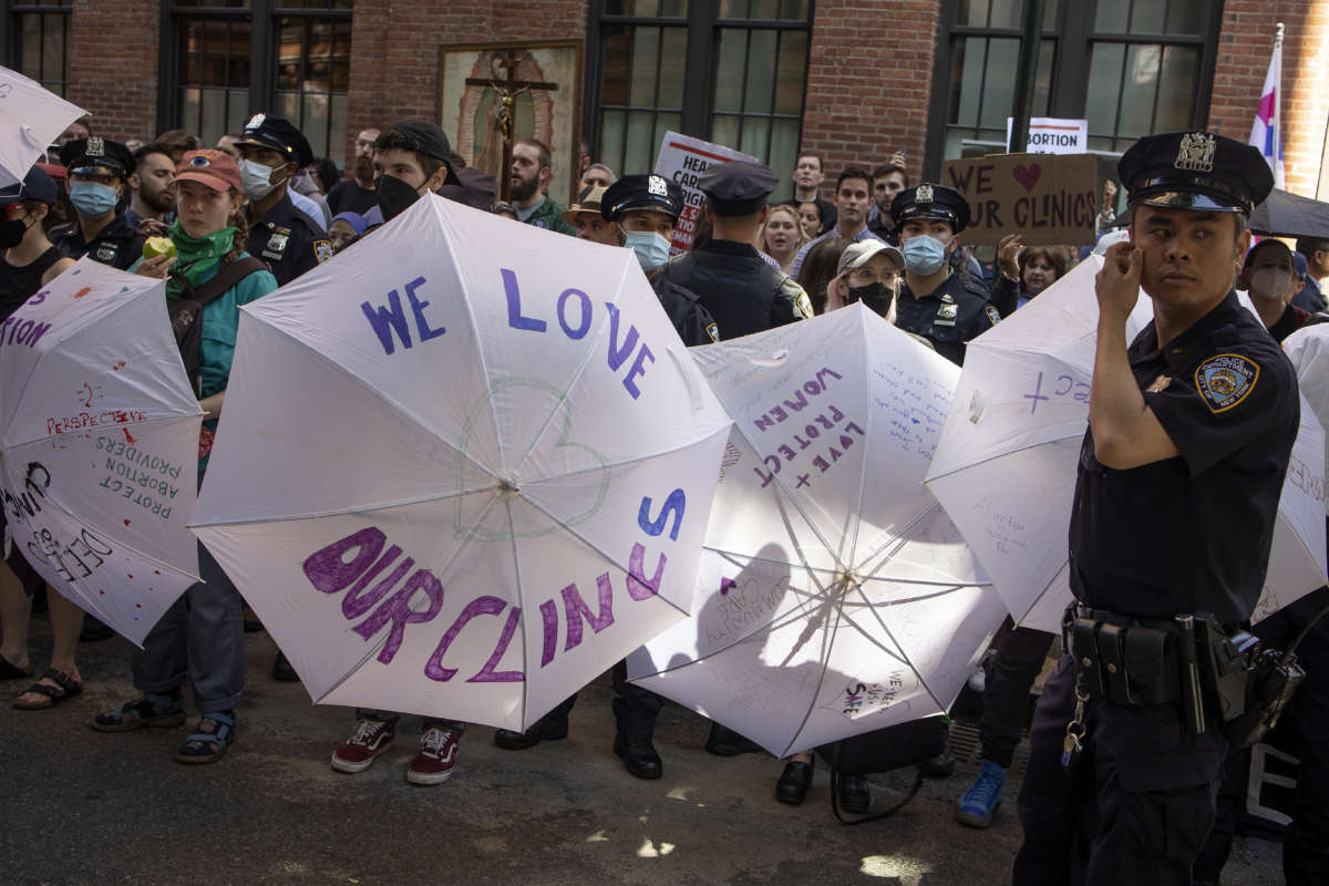 Abortion-rights activists attempt to block the path of anti-abortion protesters as they attempt to march to a nearby Planned Parenthood clinic on June 4, 2022 in New York City.