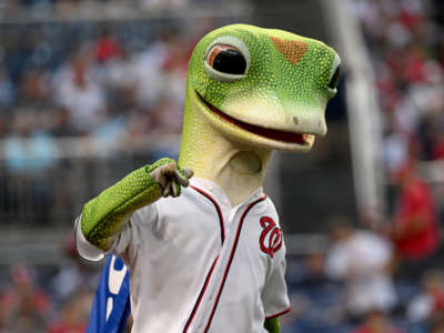 The GEICO mascot performs during the game between the Washington Nationals and the St. Louis Cardinals at Nationals Park on July 29, 2022, in Washington, D.C.