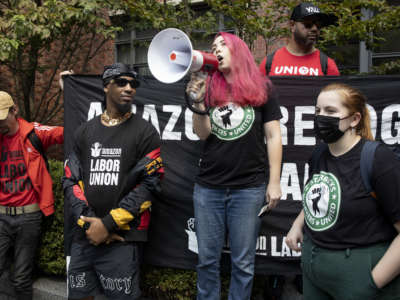 Starbucks union organizers, several who have recently been fired for their labor activities, protest outside the home of CEO Howard Schultz on Labor Day, September 5, 2022, in New York City.