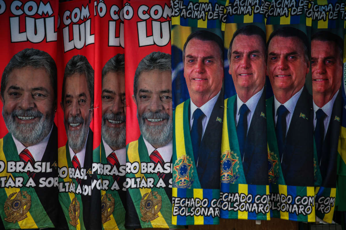 Towels with images of presidential candidates Lula da Silva and Jair Bolsonaro are displayed in a street stand in downtown São Paulo, Brazil, on September 21, 2022, ahead of presidential elections.