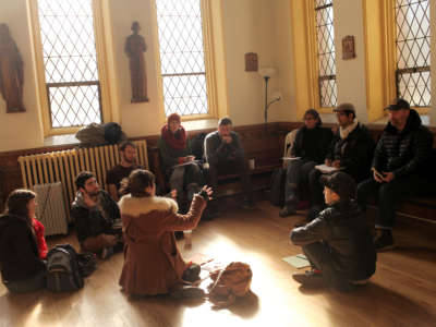 Local activists, many from the Occupy movement, organize an informal meeting to plan the distribution of supplies and volunteers in Red Hook, Brooklyn, New York, on November 4, 2012.