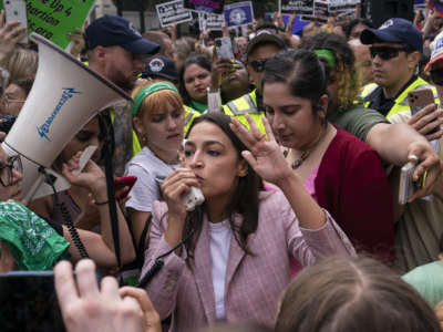 Rep. Alexandria Ocasio-Cortez (D-New York) speaks to abortion-rights activists in front of the U.S. Supreme Court after the Court announced a ruling in the Dobbs v. Jackson Women's Health Organization case on June 24, 2022 in Washington, D.C.