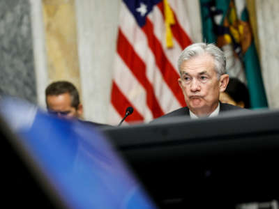 Federal Reserve Board Chairman Jerome Powell listens during a meeting with the Treasury Department's Financial Stability Oversight Council at the U.S. Treasury Department on October 3, 2022, in Washington, D.C.