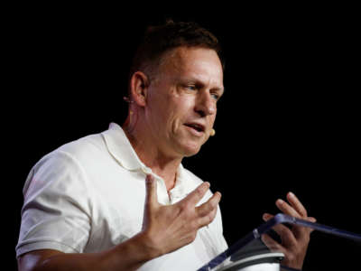 Peter Thiel, co-founder of PayPal, Palantir Technologies, and Founders Fund, gestures as he speaks during the Bitcoin 2022 Conference at Miami Beach Convention Center on April 7, 2022, in Miami, Florida.