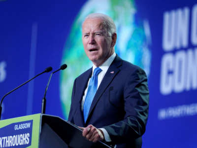 President Joe Biden delivers a speech on stage during for a meeting, as part of the World Leaders' Summit of the COP26 UN Climate Change Conference in Glasgow, Scotland, on November 2, 2021.