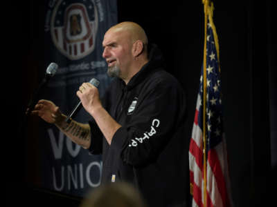 Pennsylvania Democratic candidate for Senate Lt. Governor John Fetterman speaks to supporters during a rally at the Carpenters Union Hall of Pittsburgh on November 7, 2022 in Pittsburgh, Pennsylvania.