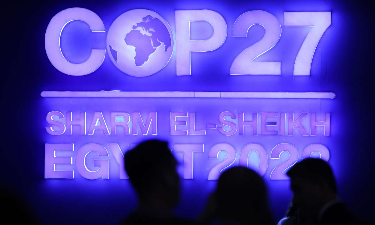 A sign stands illuminated in the plenary hall at the UNFCCC COP27 climate conference on November 7, 2022, in Sharm el Sheikh, Egypt.