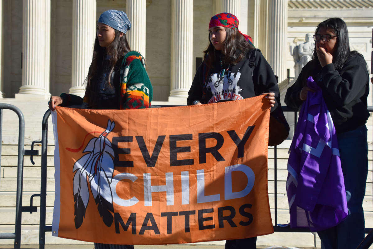 Native youth rally in front of the Supreme Court on November 9, 2022.